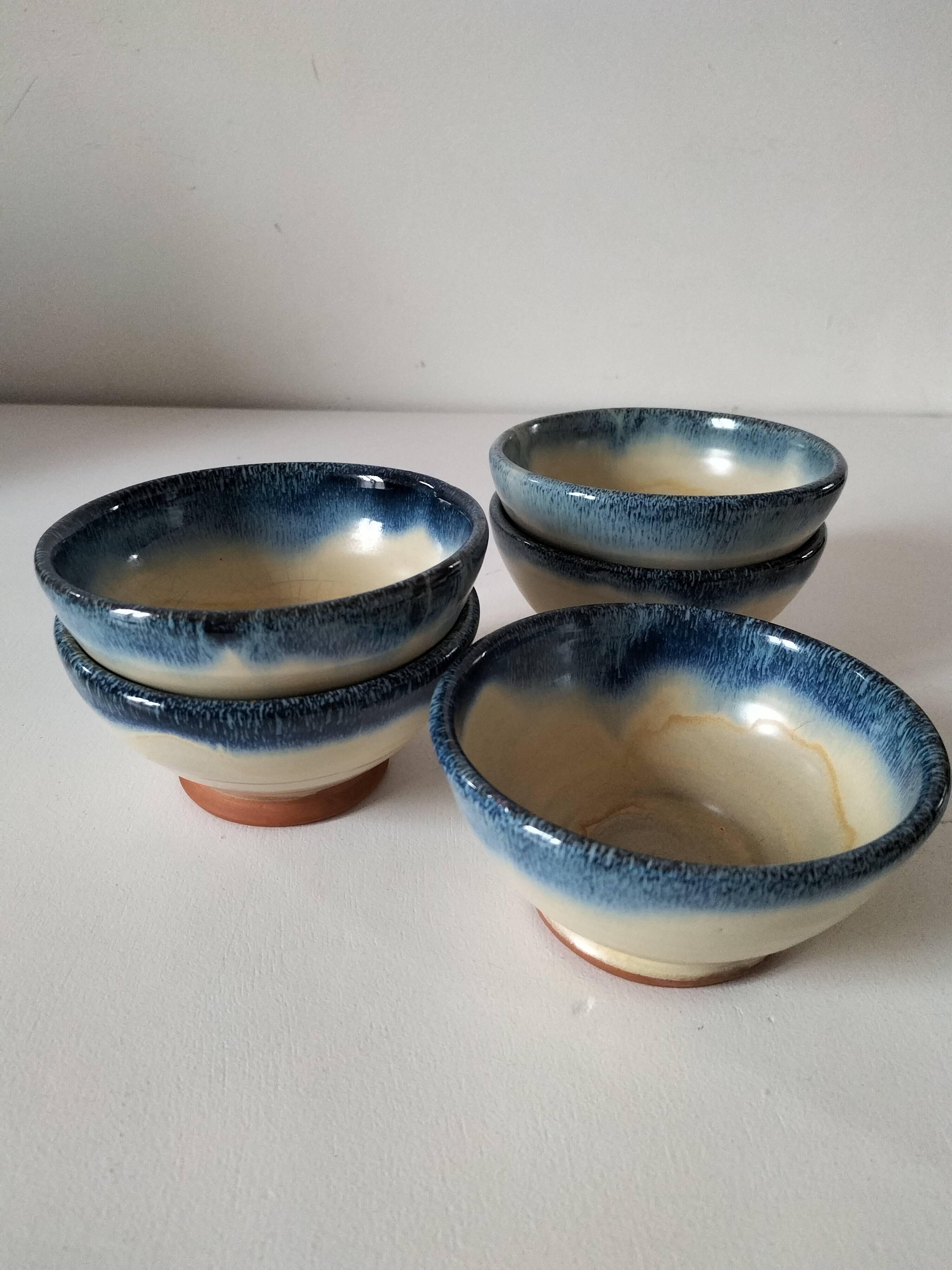 Set of 5 small blue and cream glazed stoneware bowls