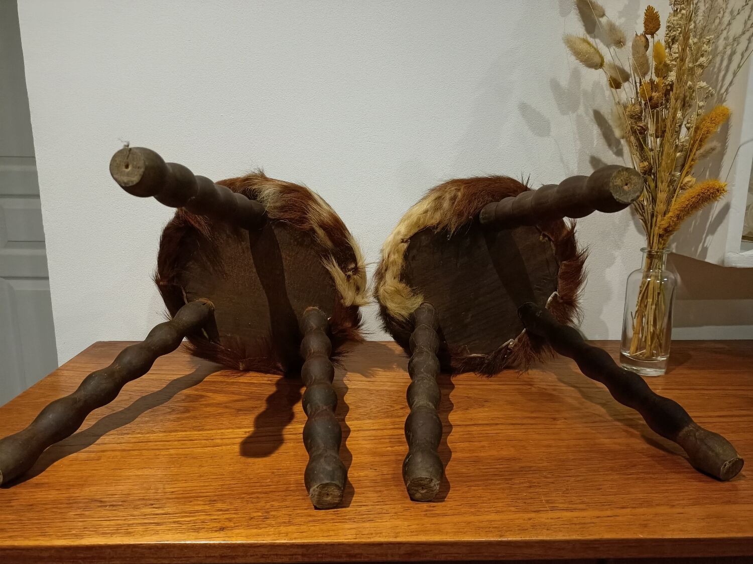Duo of cowhide stools