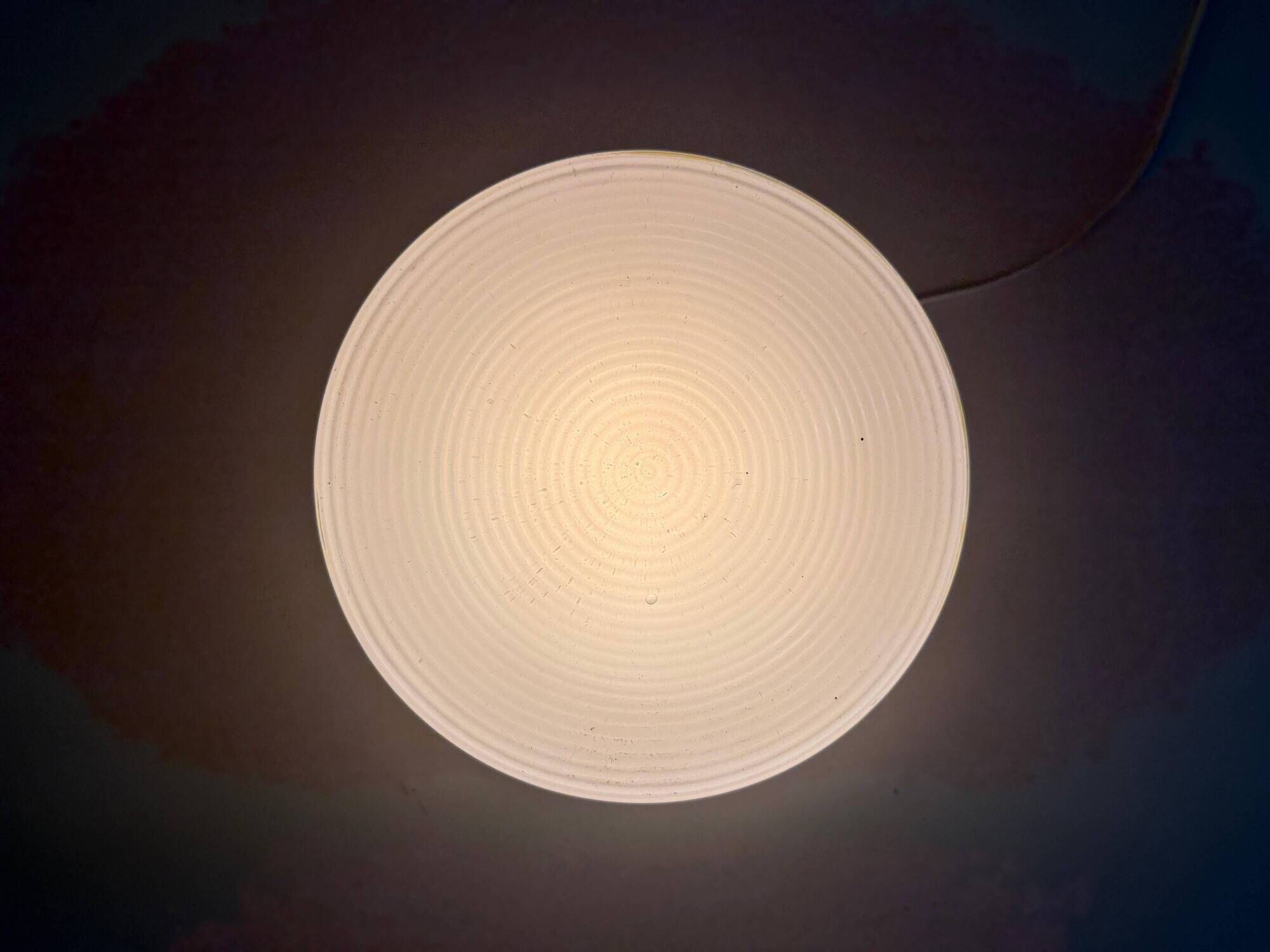 Ceiling light or wall sconce in opal glass with yellow decorations by VEB, 1950s, Germany.