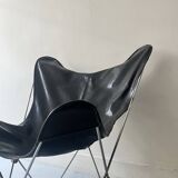 designer butterfly armchair in chrome and black leather