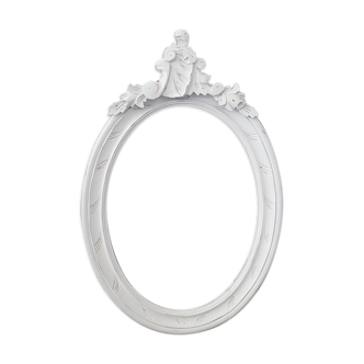 Old oval frame patinated white