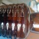 Vintage speckled amber blown glass conical vase
