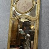 monumental Louis XVI style trumeau mirror in gilded wood