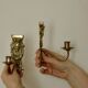 Pair of mid-century Swedish brass face motif sconces