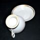 Paris porcelain – Antique round cup in soft porcelain with gold trim.