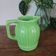 Green ceramic jug