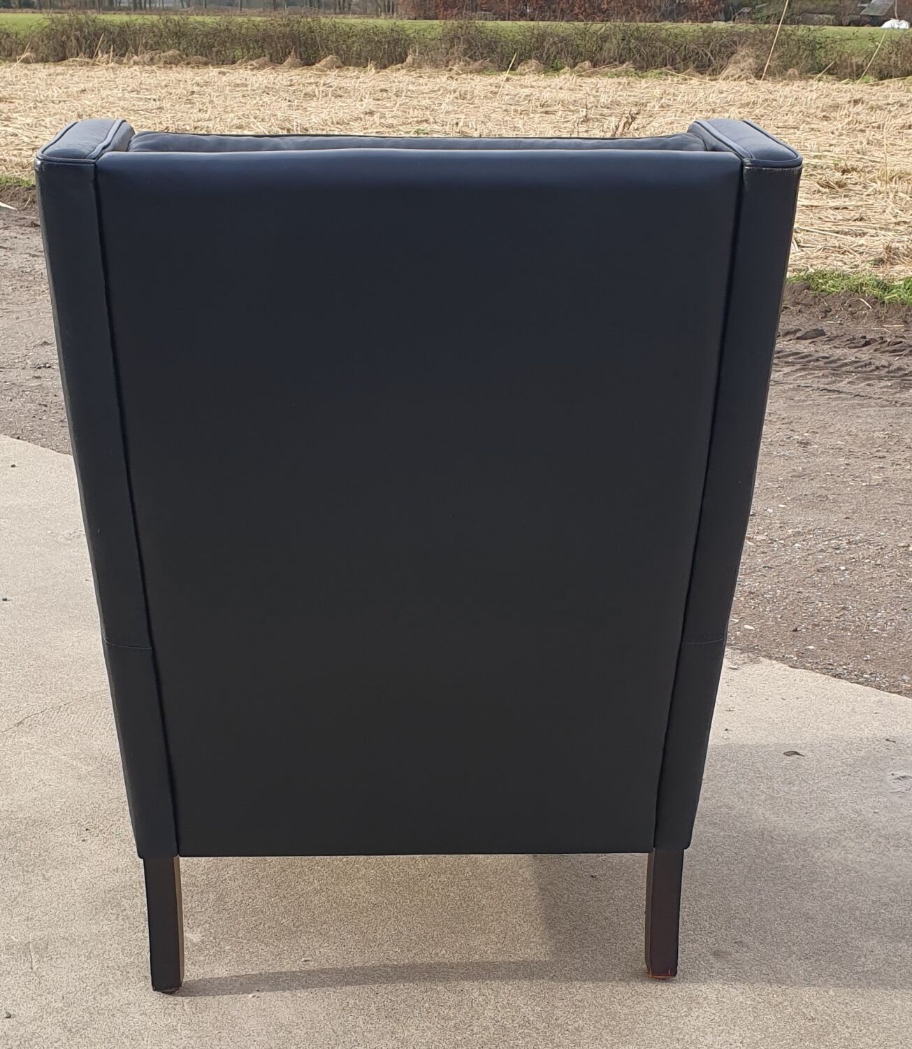 Vintage black leather scandinavian wingback chair Lulu Stouby