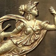 Empire-style fireplace decoration.