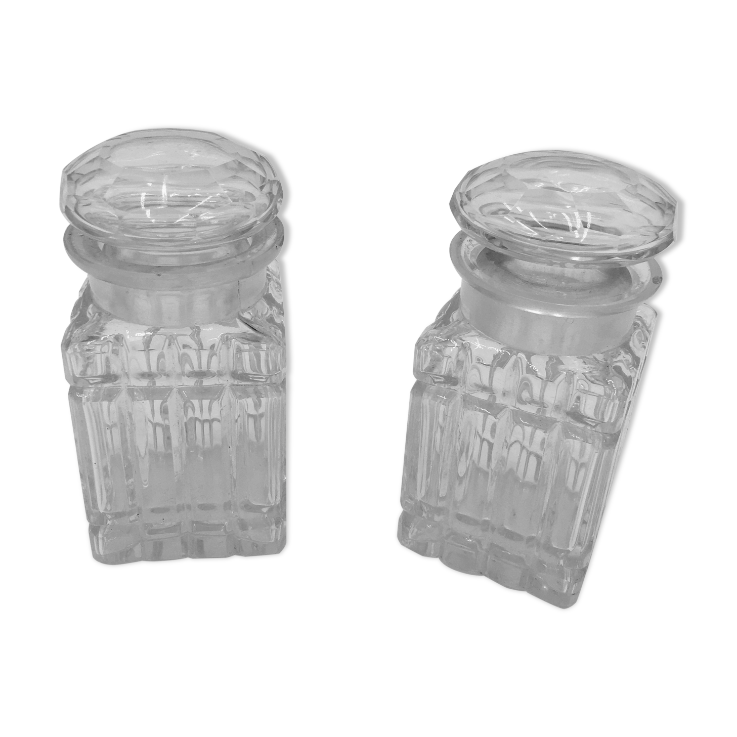 Duo of chiseled glass jars