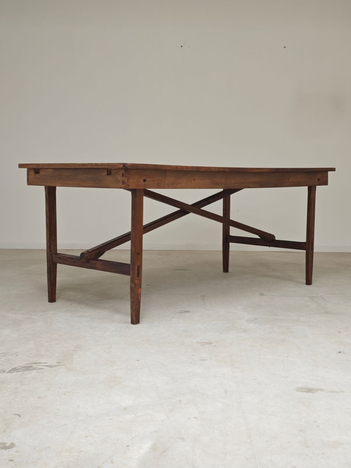 Vintage workshop folding table in oak with a hand-patinated black top.