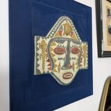 Frame with ethnic mask
