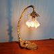 Art Nouveau table lamp in gilded bronze and opalescent glass