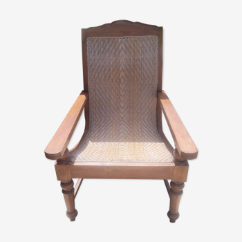 Colonial armchair in teak and rattan