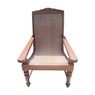 Colonial armchair in teak and rattan
