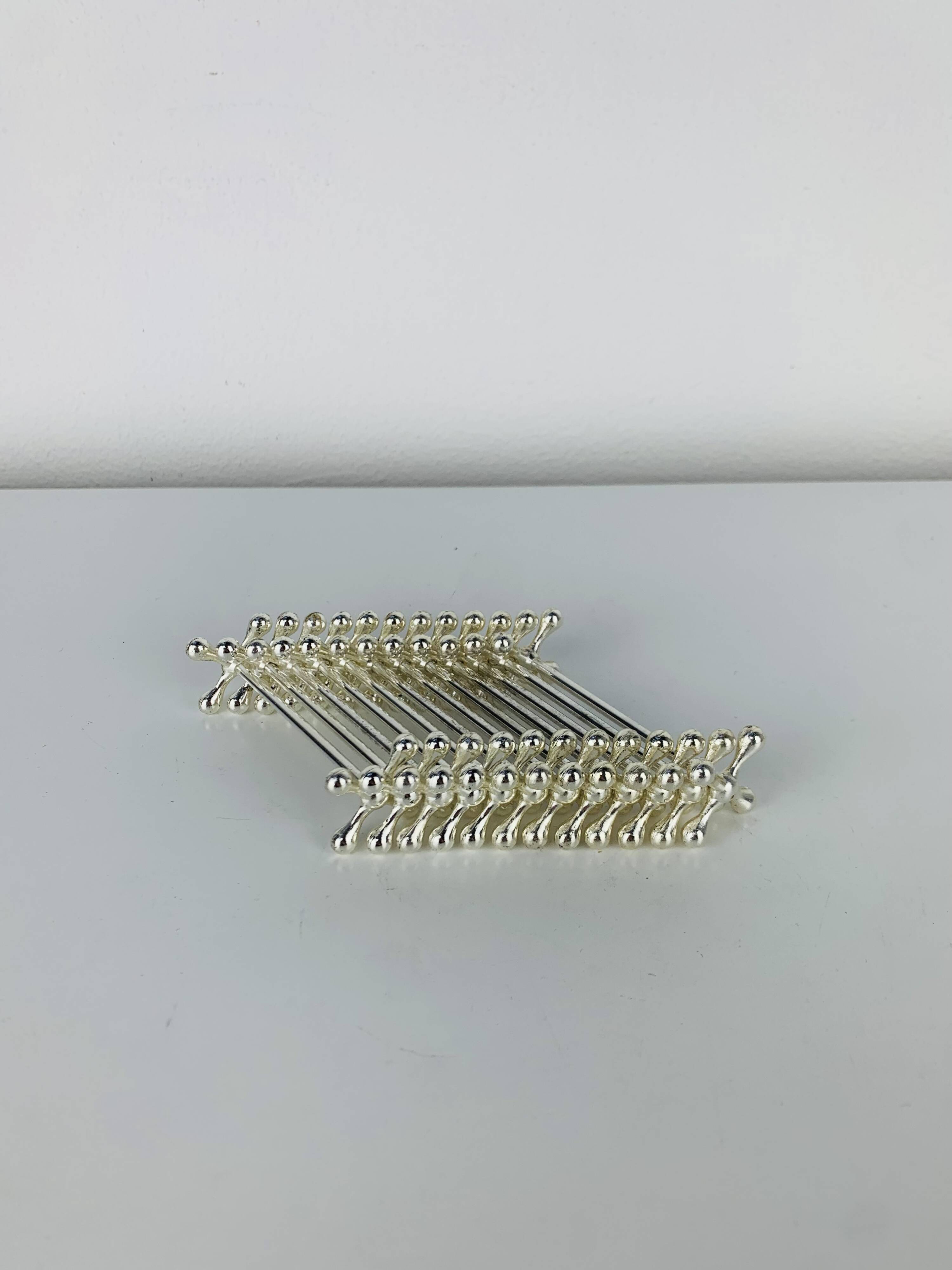 12 space age silver-plated knife rests by WMF, 1970