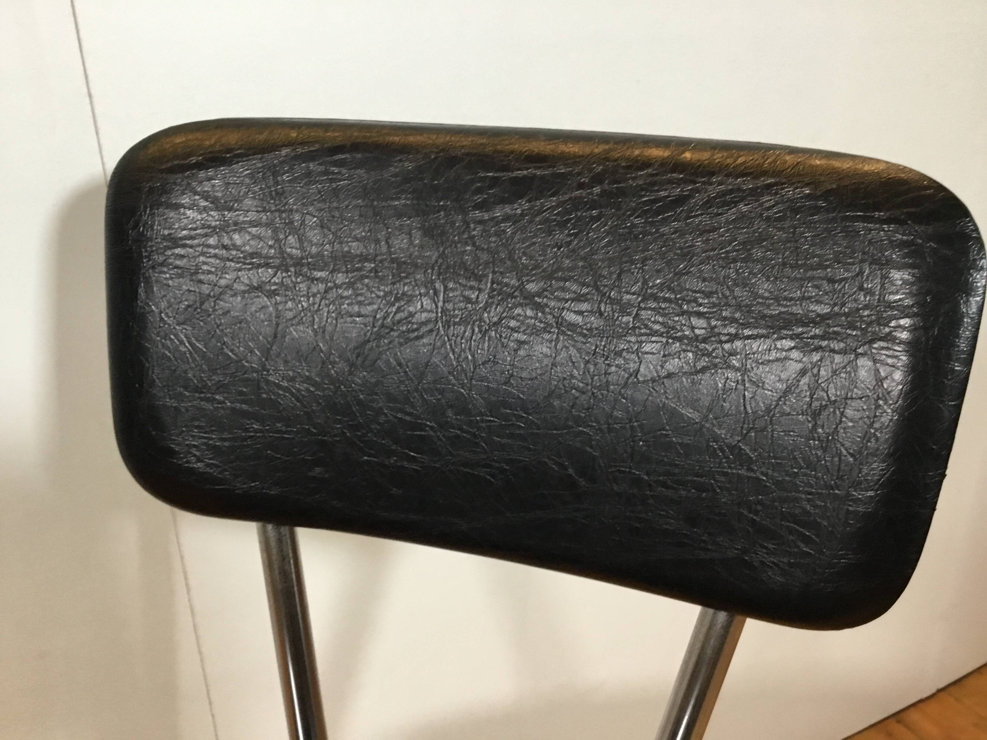 vintage chromed tubular steel stackable dining chairs