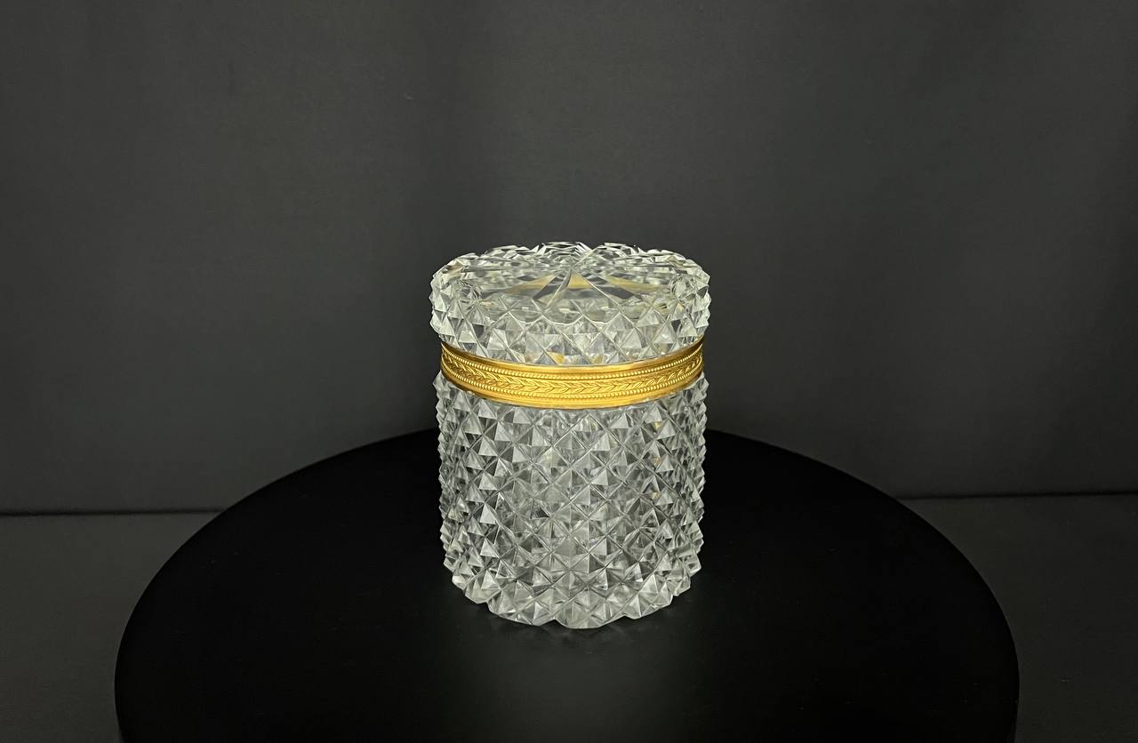 Cut crystal box with gilded bronze mount.