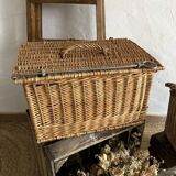 Antique wicker basket with closure and handle