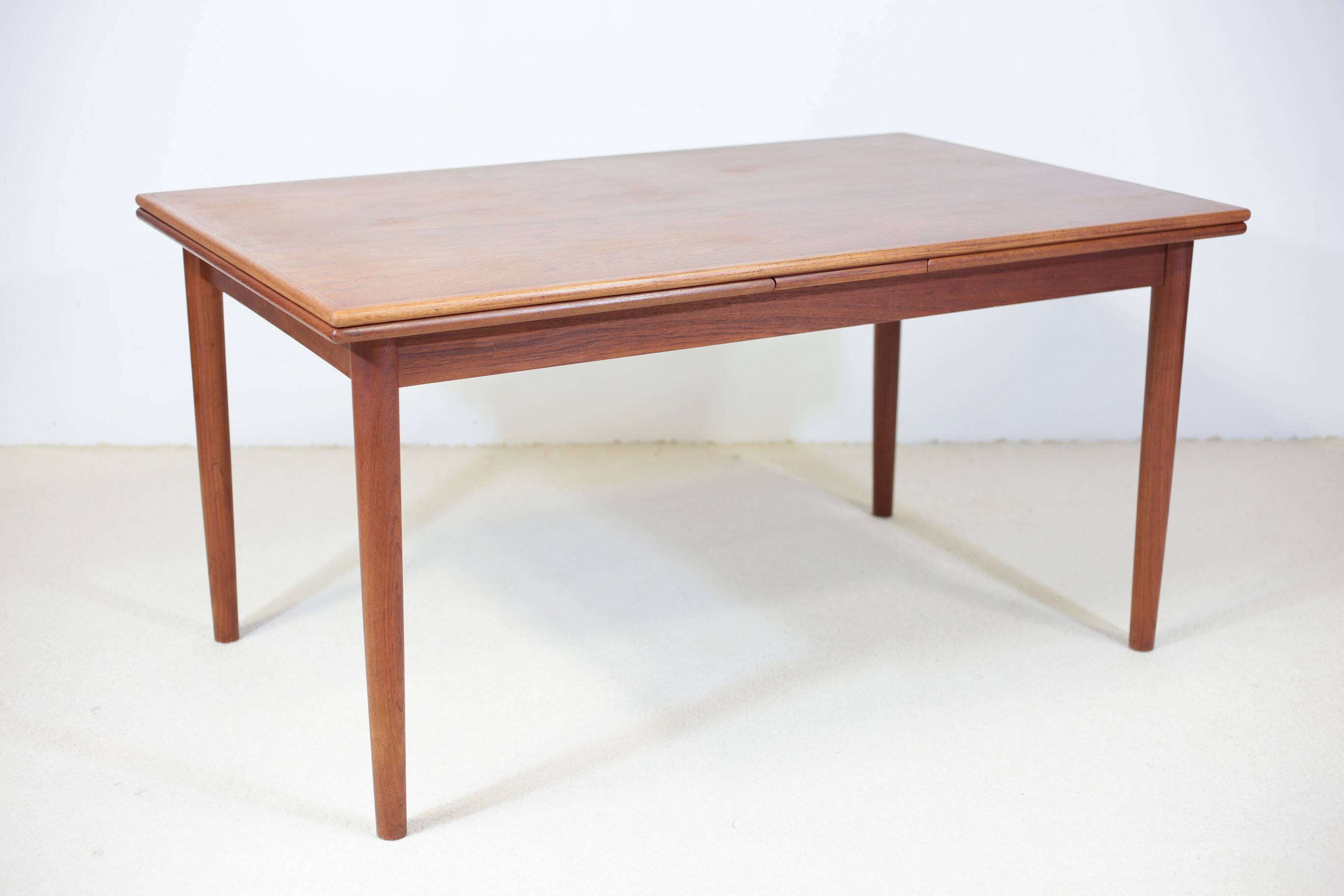 Danish dining table in teak.