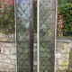 Pair of old double stained glass doors. Metal frames. Stained glass windows
