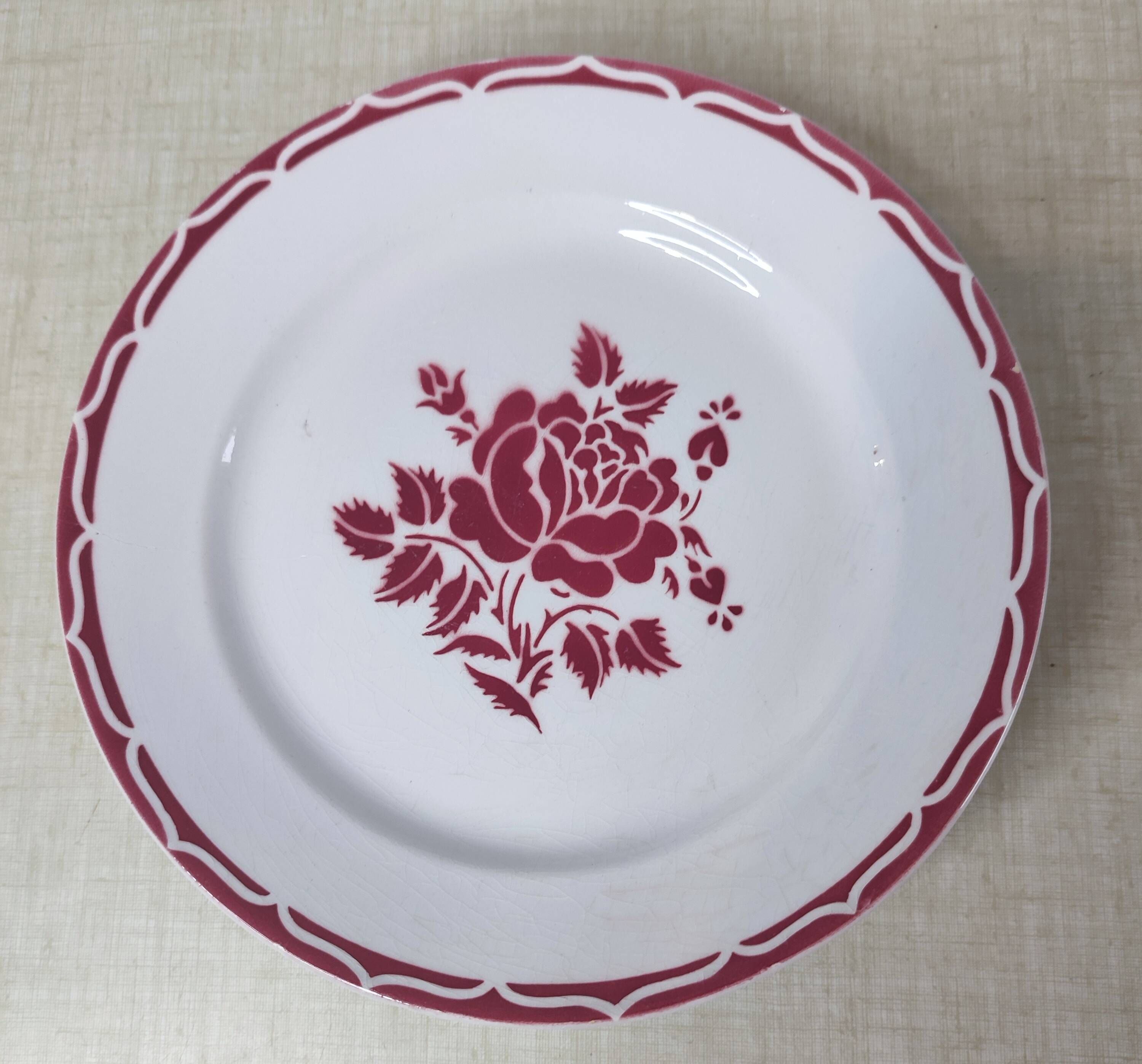 Lot of 17 vintage porcelain plates and a platter from the 1940s