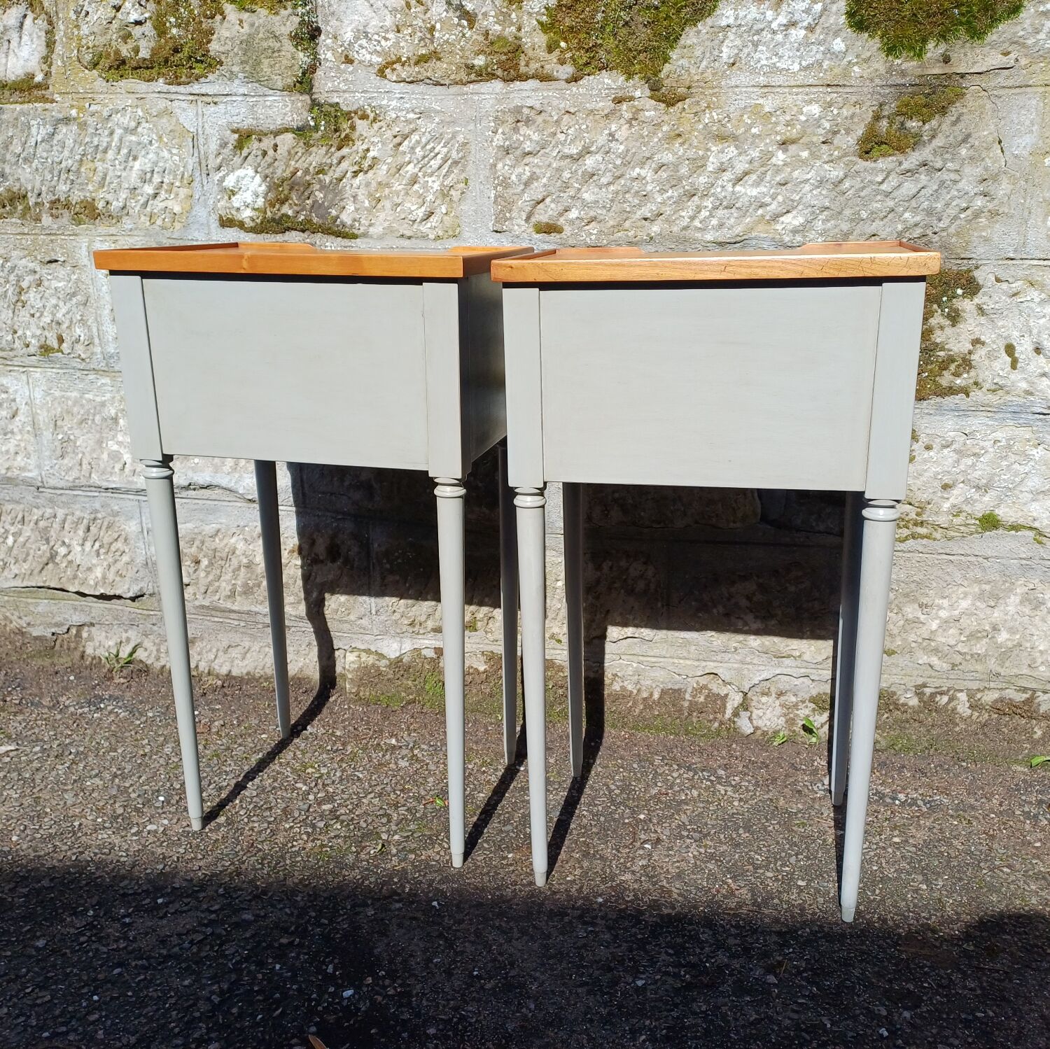 Pair of patinated bedside tables in Louis XVI style