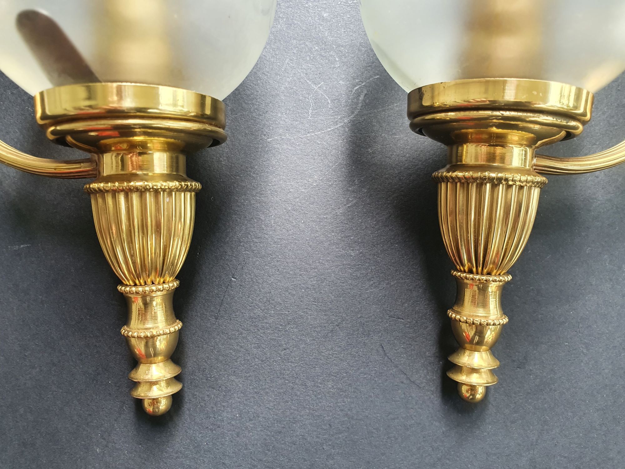 Pair of antique gold wall sconces