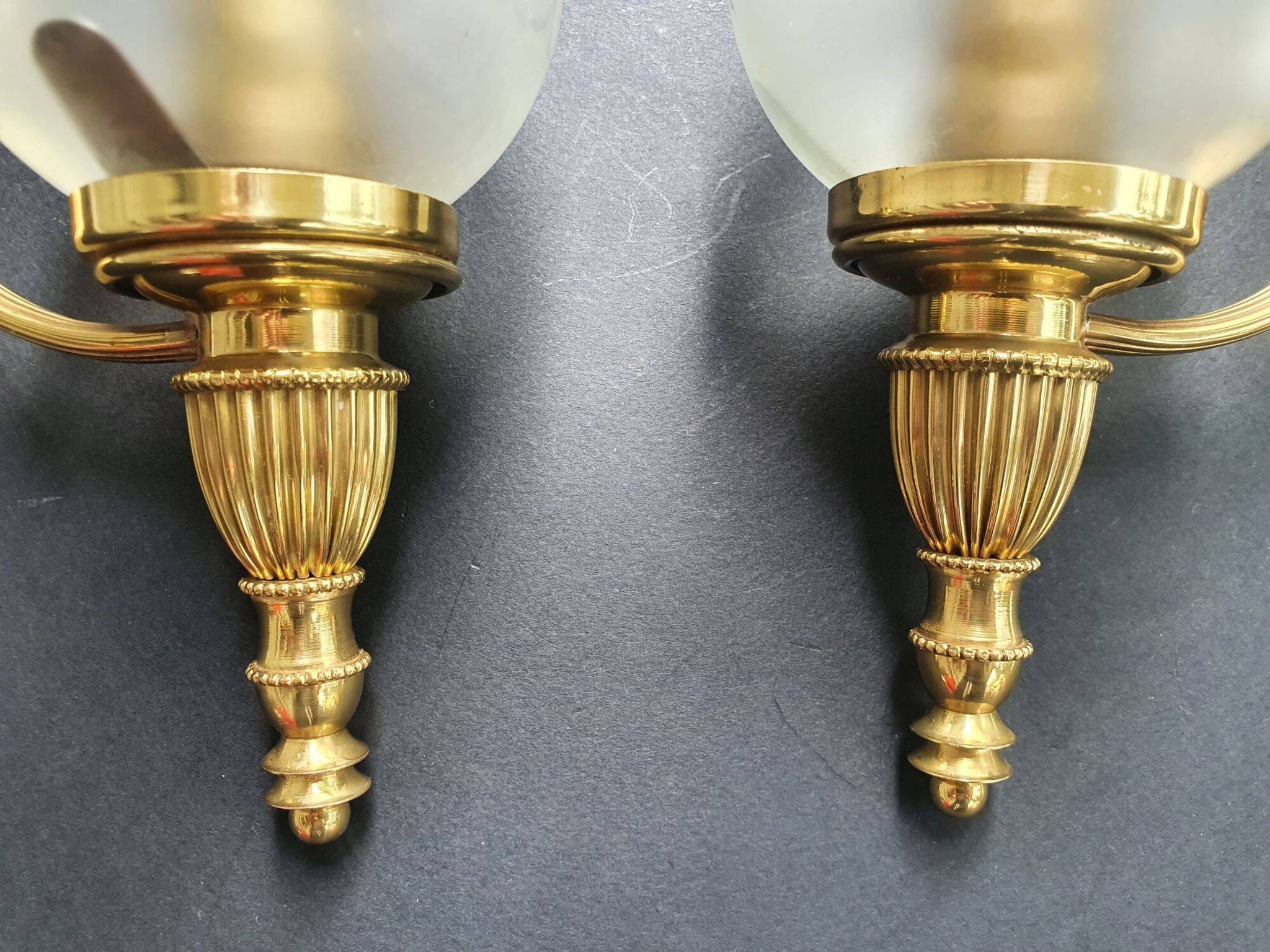 Pair of antique gold wall sconces
