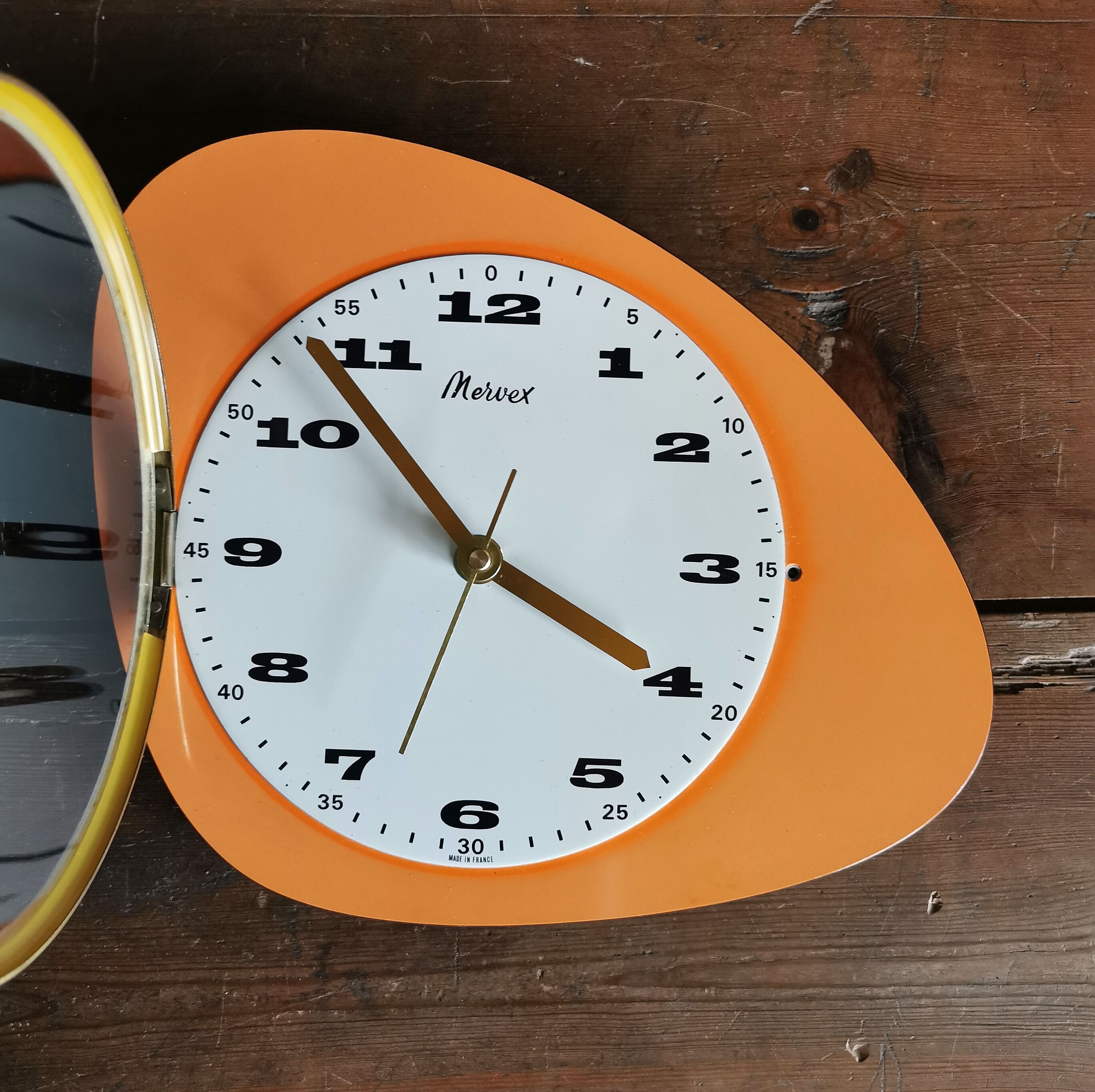 Vintage formica clock asymmetrical silent wall clock "Mervex orange"