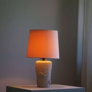 Modern vintage French table lamp, made of stone with fish patterns, 1970s.