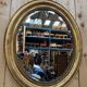 Oval mirror Napoleon III – Gilded with gold leaf – Wood and stucco