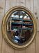 Oval mirror Napoleon III – Gilded with gold leaf – Wood and stucco