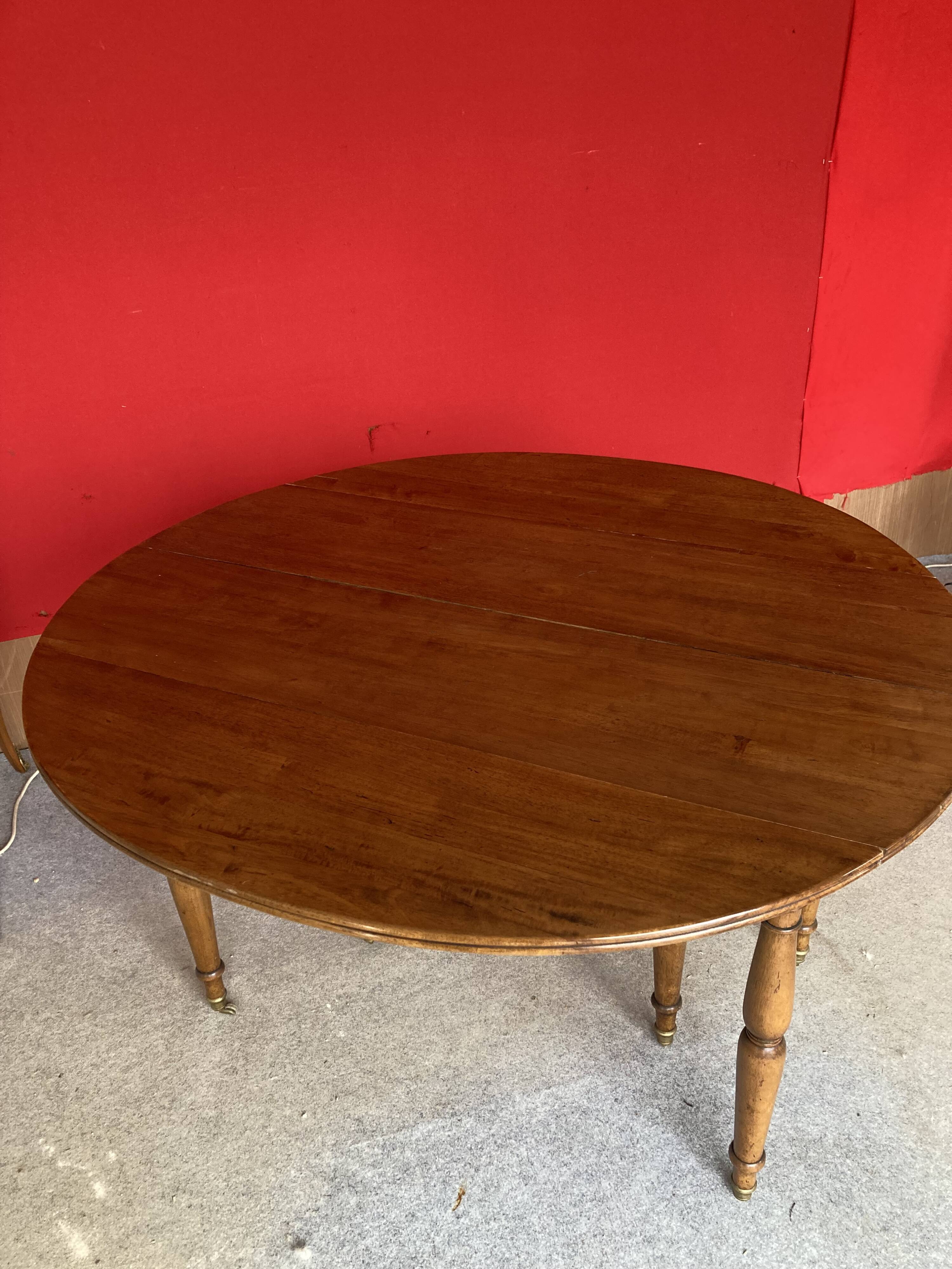 Cherry wood drop-leaf table.
