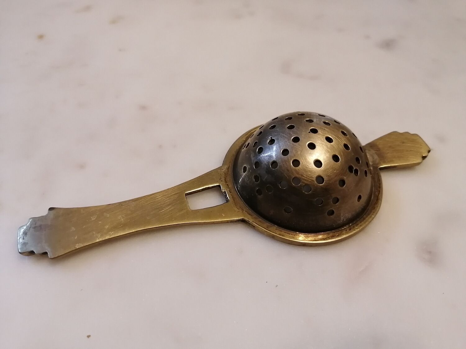 Art deco tea colander