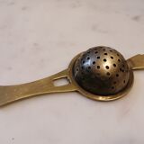 Art deco tea colander