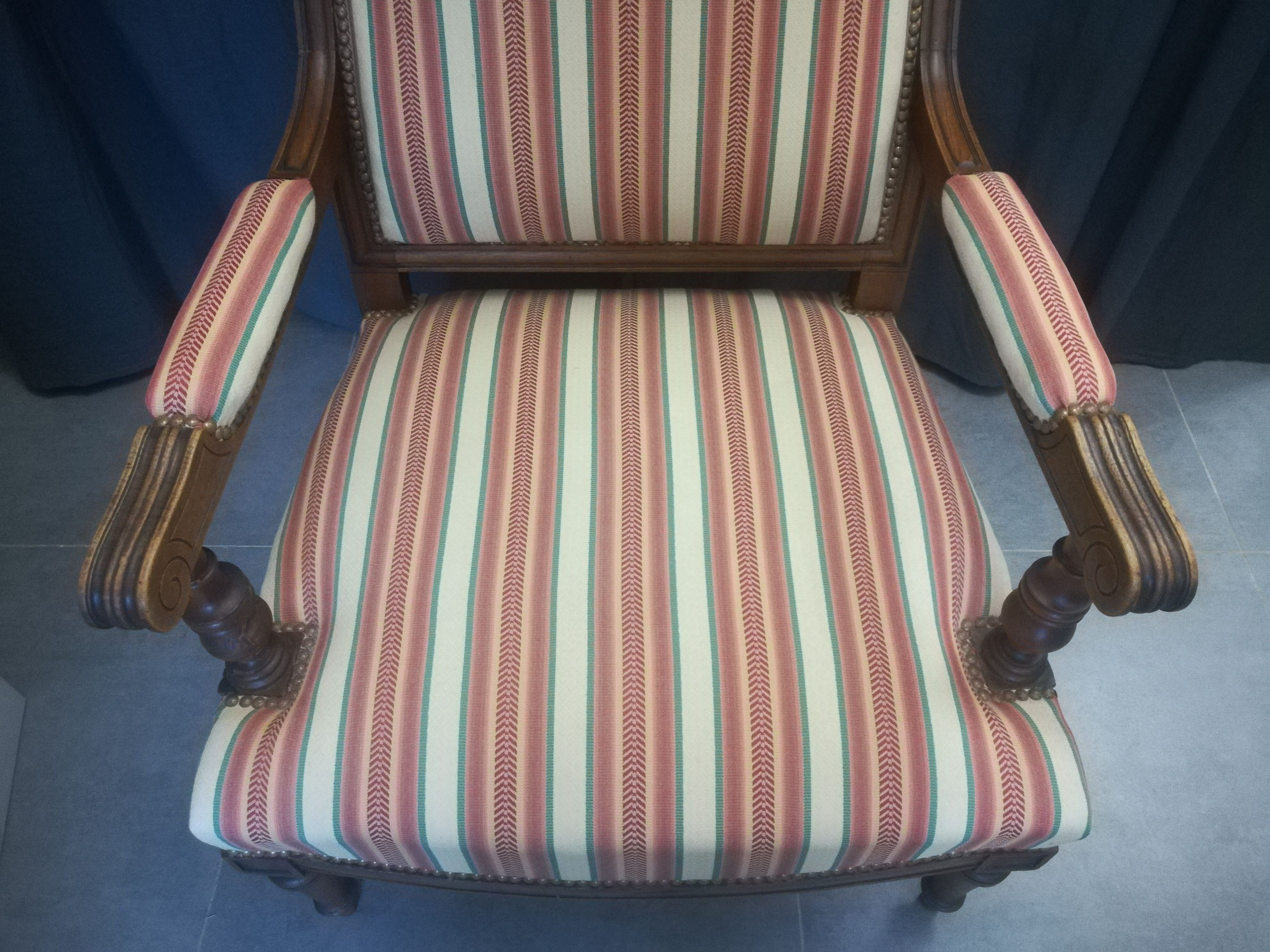 Pair of Louis XVI style walnut armchairs