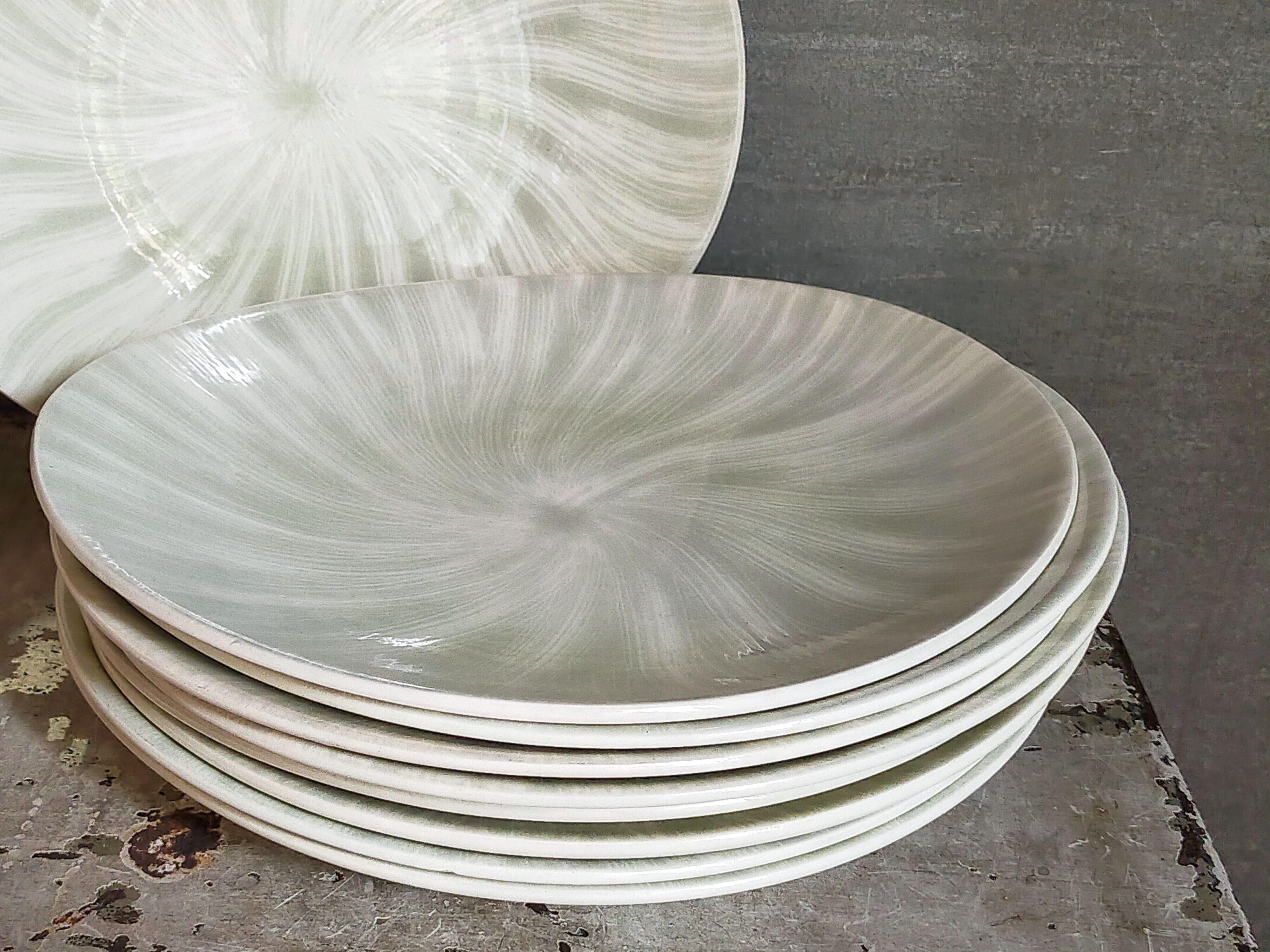 Nine earthenware plates from Salins-les-Bains vintage