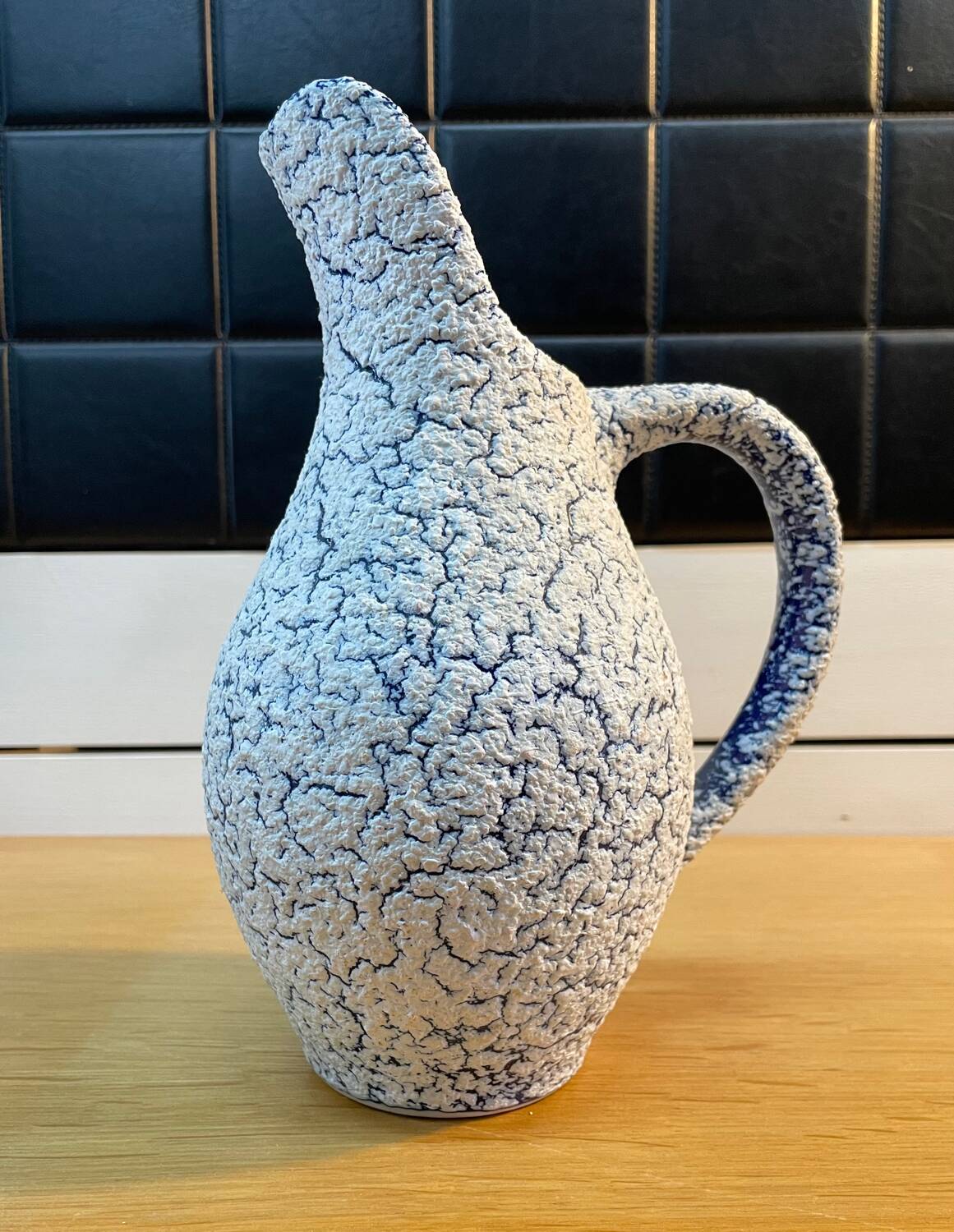 White and blue crisped ceramic pitcher