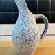 White and blue crisped ceramic pitcher