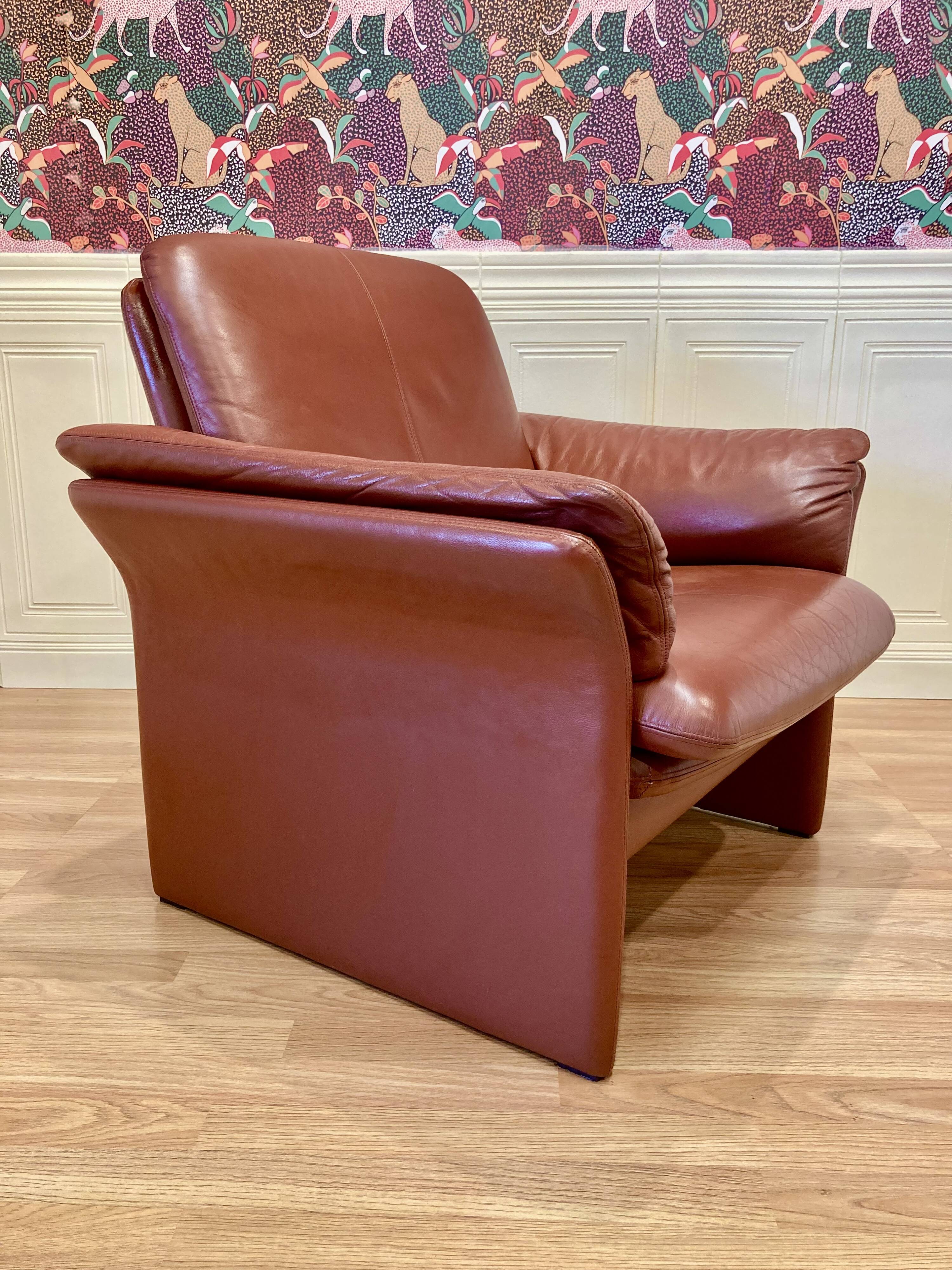 Pair of "Erpo" designer adjustable leather armchairs.