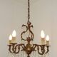 Antique French bronze chandelier with 6 lights and matching crystals.