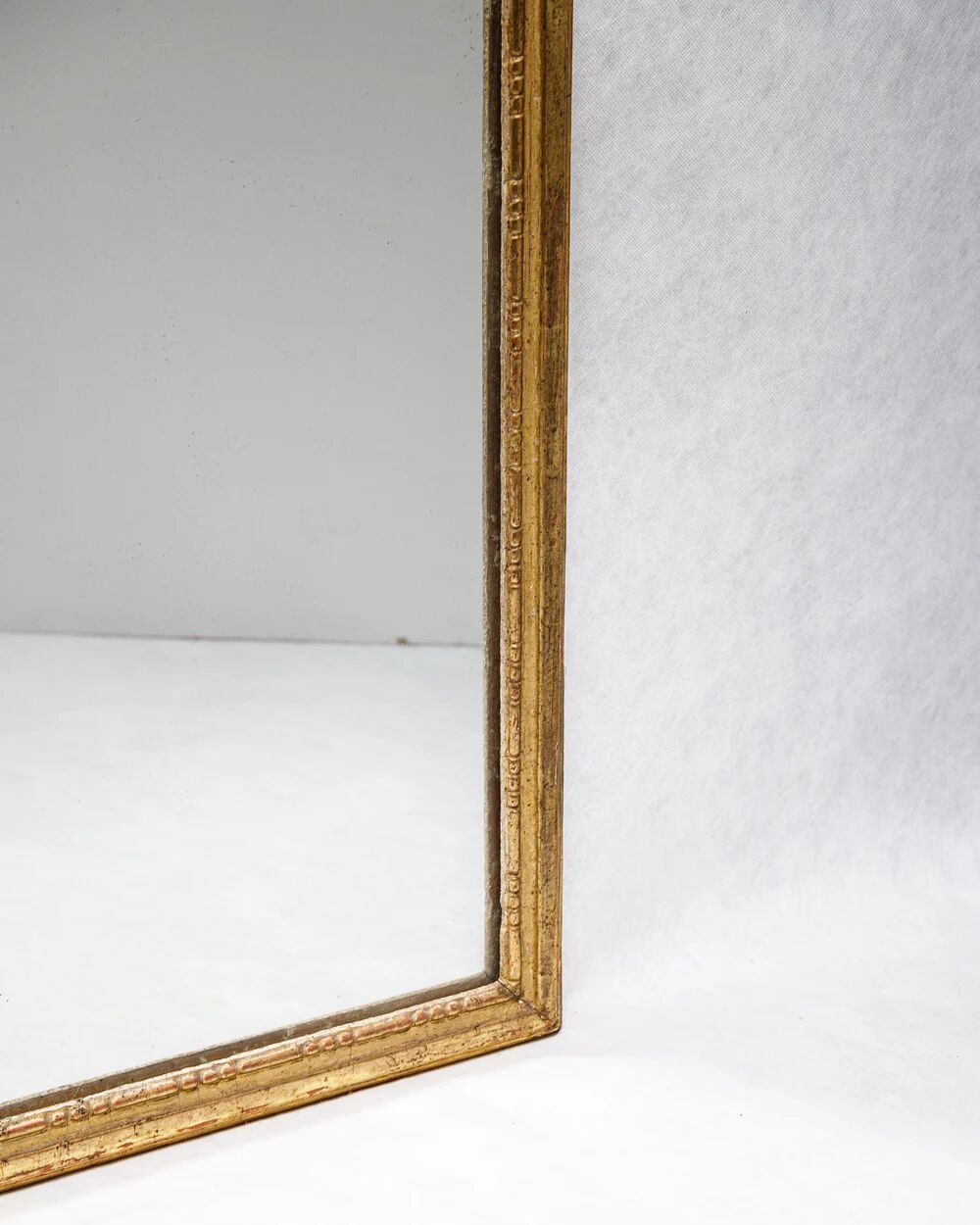Small Louis XVI giltwood "square" mirror