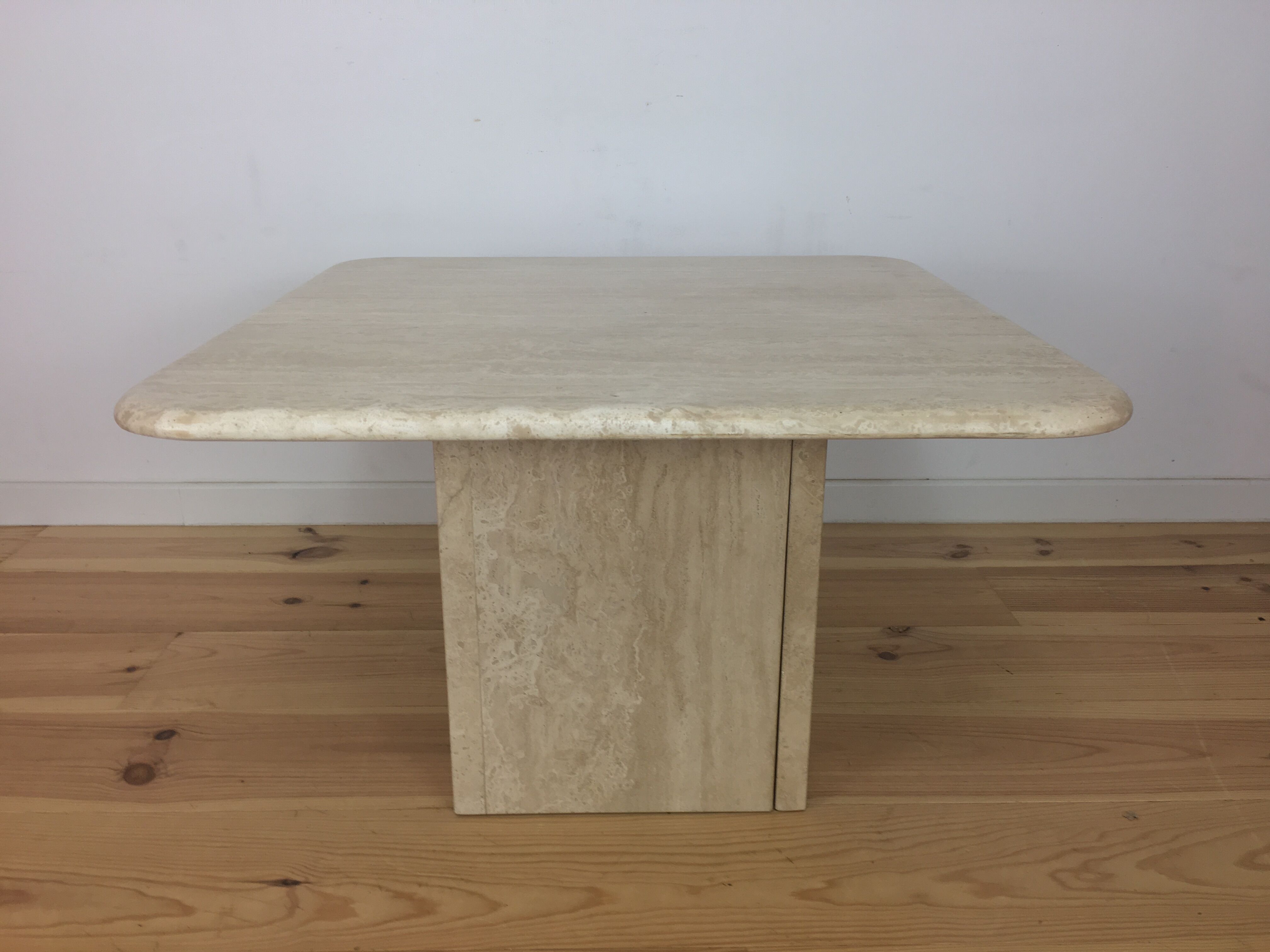 Square travertine coffee table