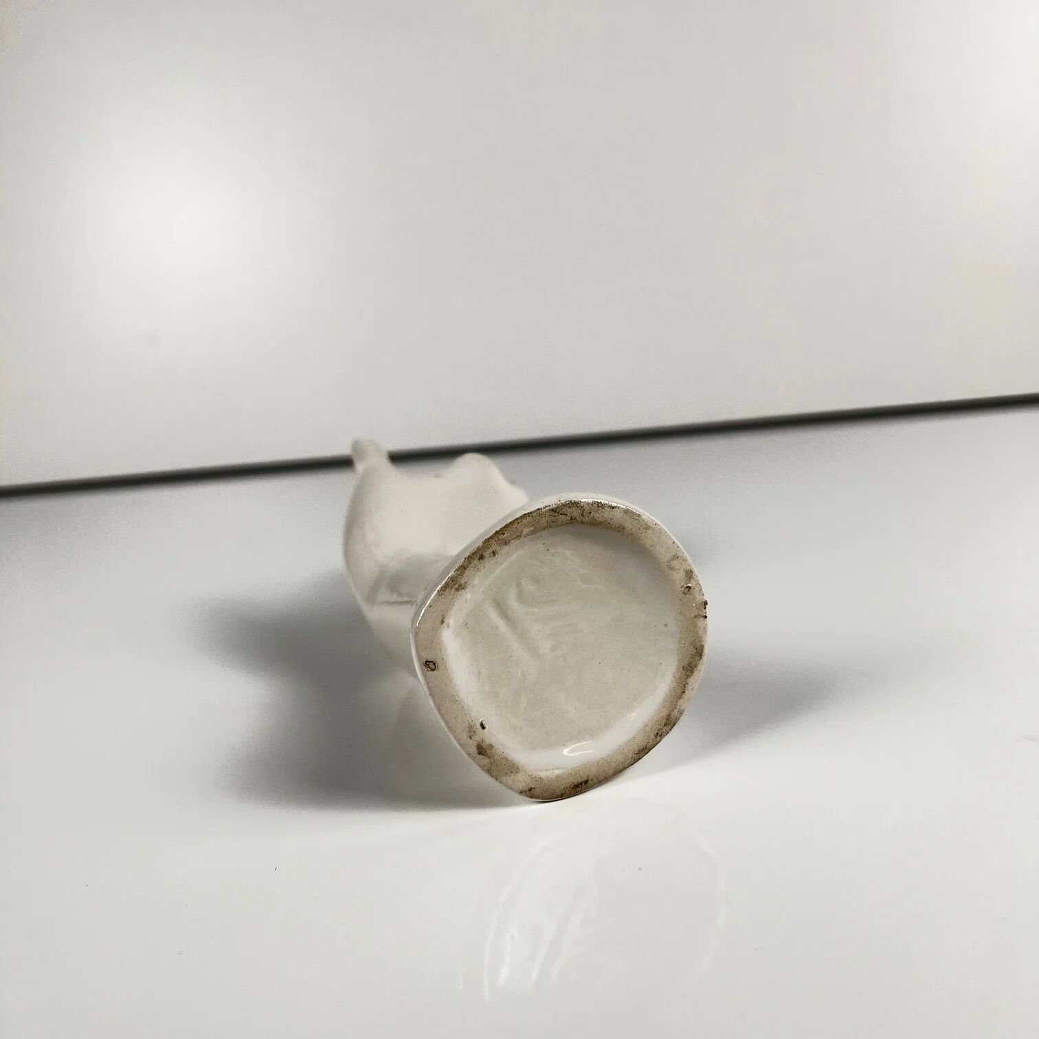 White porcelain single-stem vase