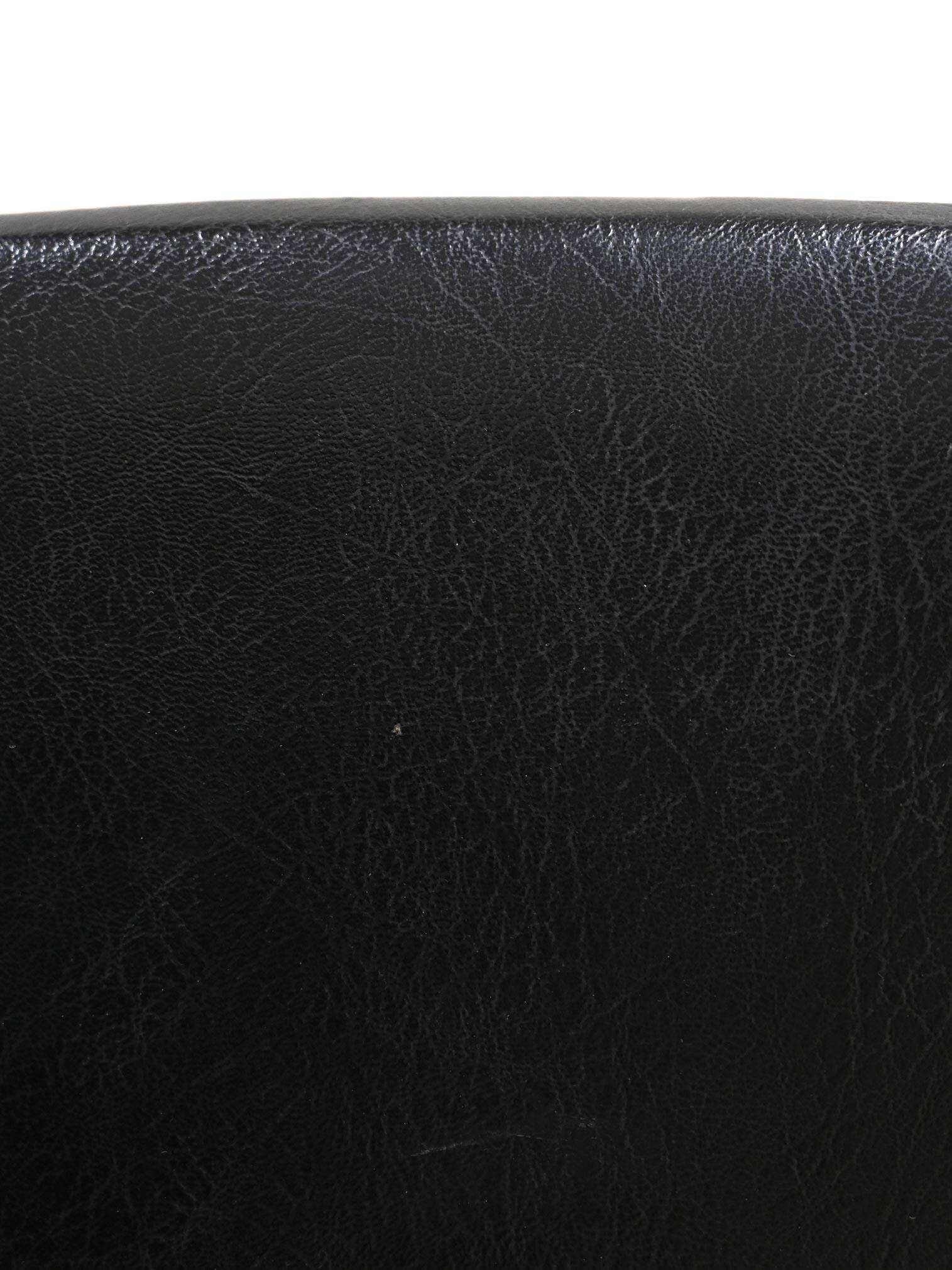 Scandinavian armchair covered in imitation leather