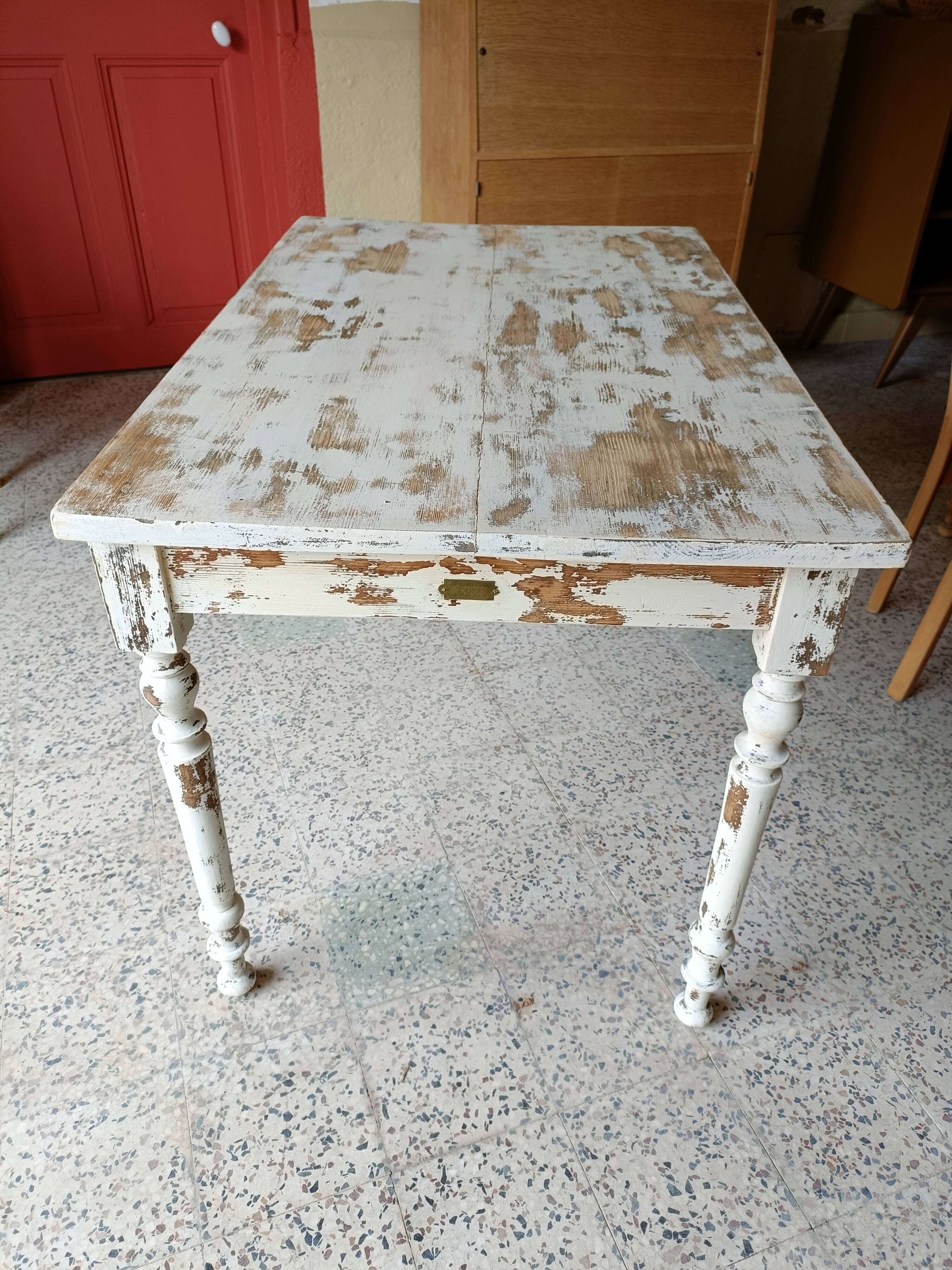 Patinated wooden table, restored.