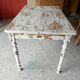 Patinated wooden table, restored.
