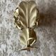 Ecru metal flower wall sconce