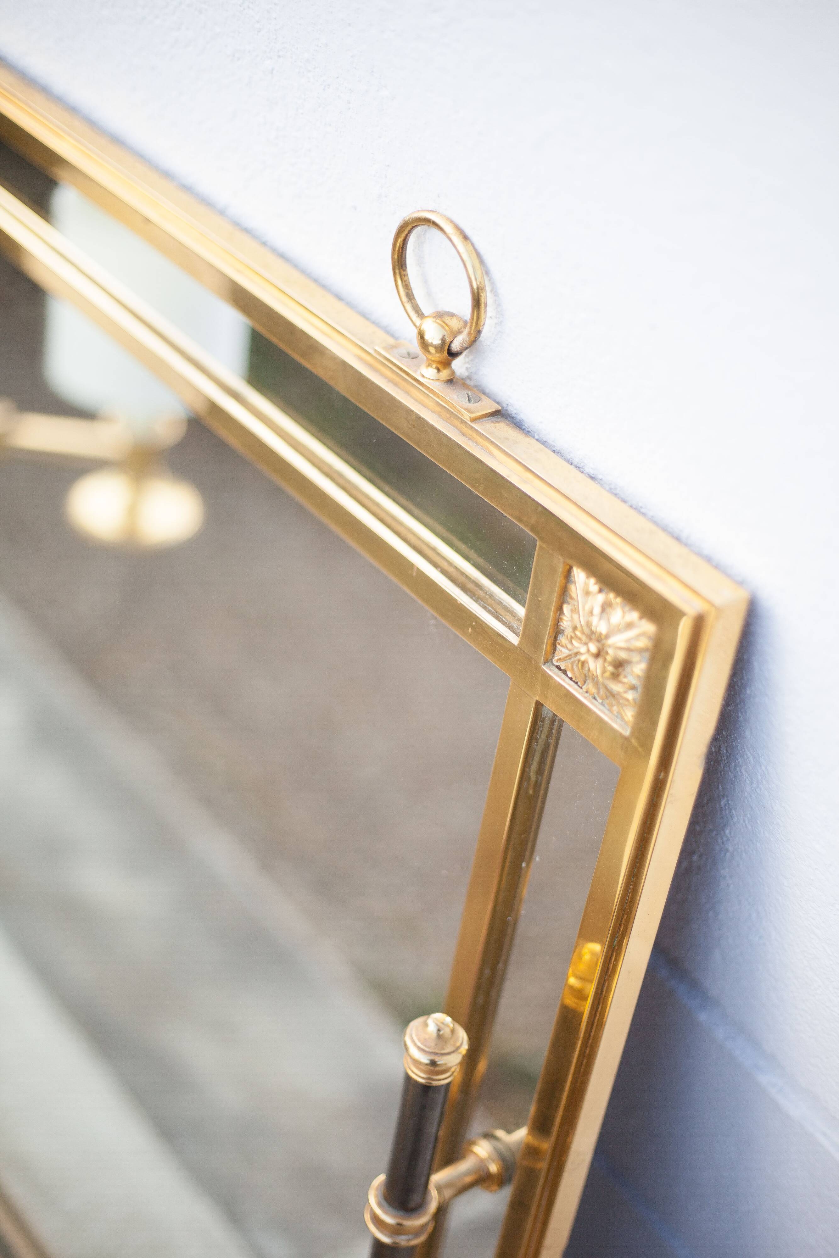 mirror with articulated wall light