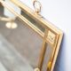 mirror with articulated wall light